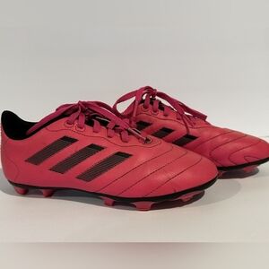 Adidas Goletto youth soccer cleats in a pink and black colorway